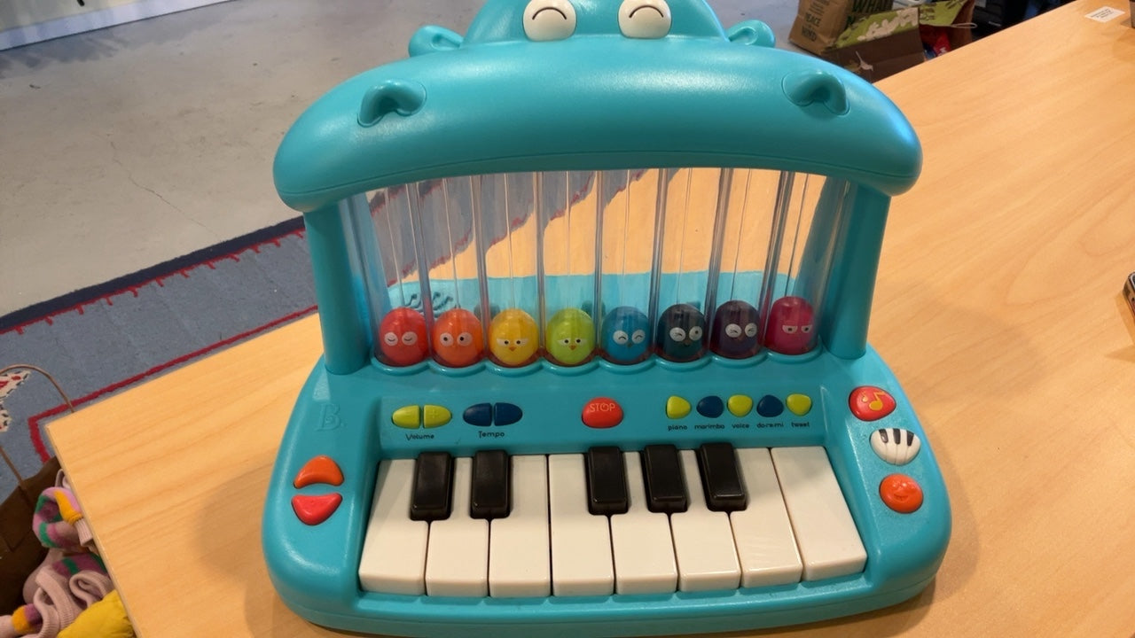 B. toys Hippo Pop musical toy keyboard