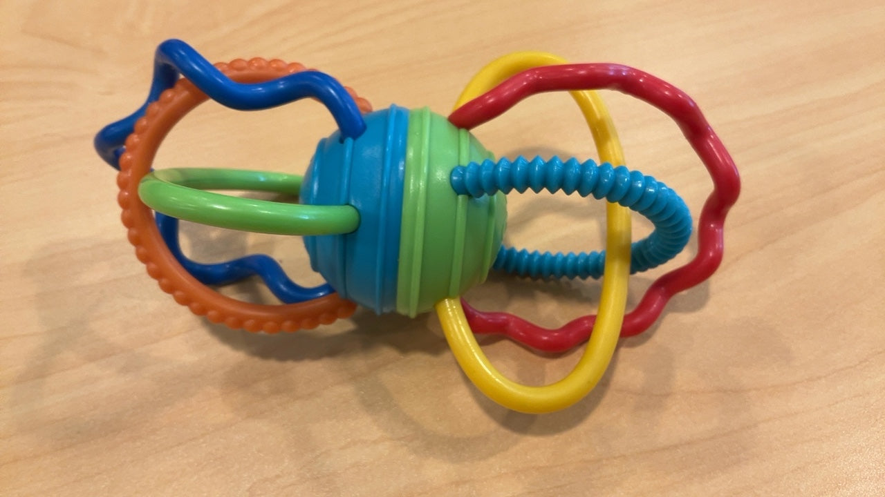 Bright Starts Oball Clickity Twist sensory rattle and teether toy